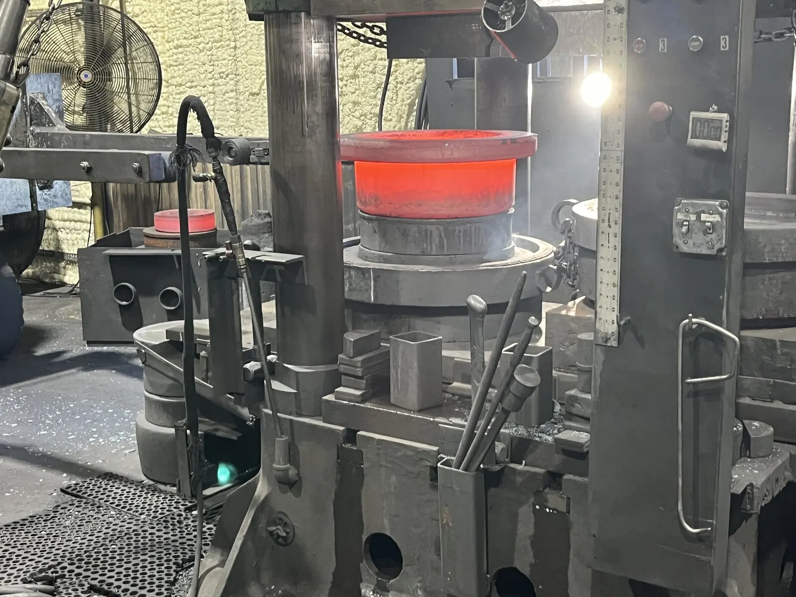 Contour-forged component showing grain lines curving with the part profile